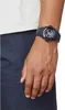 A close-up shot of a person's wrist wearing a black Casio G-Shock watch. Produktbild-Vorschau