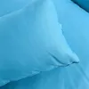 A close-up view of a light blue cushion or pillow, showing the texture of the fabric and stitching. Produktbild-Vorschau