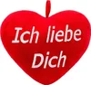 A close-up of a red heart-shaped pillow with white text. Produktbild-Vorschau