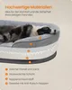 A cross-section of a dog bed showing its layered construction, with a dog resting on top. Produktbild-Vorschau