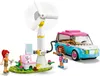 A LEGO set depicting a wind turbine charging an electric car, with two mini-doll figures and a dog. Náhled obrázku produktu