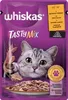 A pouch of Whiskas cat food with a cat peeking over the edge and a dish of food in the foreground. Produktbild-Vorschau