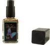 A perfume bottle and its cap are shown against a white background. Produktbild-Vorschau