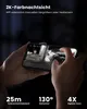 A person is holding a smartphone displaying a security camera feed, with marketing text and feature callouts overlaid on the image. Produktbild-Vorschau