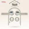 A marketing image showcasing two door handles and two keyhole escutcheons, presented within a stylized house outline. Produktbild-Vorschau