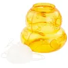 A yellow plastic insect trap with a white lid and string. Produktbild-Vorschau