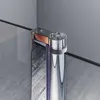 A close-up view of a shower hinge on a glass shower door. Podgląd zdjęcia produktu