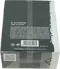 The image shows the side and bottom of a black and gray perfume box for Comme des Garçons Black Pepper. Voir les images du produit