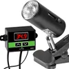 A black lamp with a clip base and a separate black control box with a digital display are shown against a white background. Anteprima dell’immagine prodotto