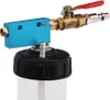 A close-up shot of a brake bleeding device with a blue aluminum block, brass valve with a red handle, and a black cap on a clear container. Produktbild-Vorschau
