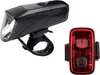 A black bicycle headlight and a red bicycle taillight are shown against a white background. Produktbild-Vorschau