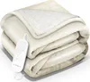 A folded beige electric blanket with a white controller attached. Voir les images du produit