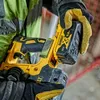 A person wearing work gloves and a high-visibility vest is holding a yellow and black DeWalt cordless drill with a battery pack attached. Produktbild-Vorschau
