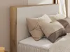 A close-up view of a bed with pillows. Náhled obrázku produktu
