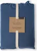 A folded blue duvet cover is presented with a cardboard tag and a ribbon. Anteprima dell’immagine prodotto