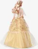 A Barbie doll wearing a formal gown. Náhled obrázku produktu