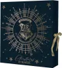 A dark blue advent calendar box with gold celestial and Hogwarts crest designs, tied with a gold ribbon. Produktbild-Vorschau