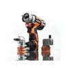 A cordless drill with accessories on a reflective white surface. Náhľad obrázku produktu