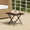 A small folding table with a tray of fruit and drinks on a wooden deck. Anteprima dell’immagine prodotto