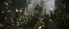 A mystical forest scene with a central shrine and various statues and decorations. Produktbild-Vorschau