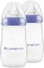 Two clear baby bottles with purple collars and clear nipples are shown against a white background. Voir les images du produit
