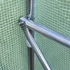 A close-up view of a metal frame joint for a greenhouse or tunnel, covered by a green mesh fabric. Anteprima dell’immagine prodotto