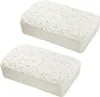 Two white rectangular blocks with a porous texture, likely dehumidifiers. Anteprima dell’immagine prodotto