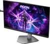 A gaming monitor displaying a vibrant, futuristic image with a character and abstract shapes. Produktbild-Vorschau