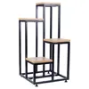 A multi-tiered plant stand with a black metal frame and wooden shelves, shown against a white background. Anteprima dell’immagine prodotto