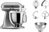 A silver KitchenAid Artisan stand mixer with various attachments and a bowl, displayed against a white background. Podgląd zdjęcia produktu