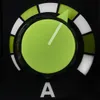 A close-up of a green dial with a pointer and a scale of white and green segments, with the letter 'A' below it. Produktbild-Vorschau