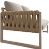 A close-up side view of a modern outdoor sofa with a woven back. Voir les images du produit