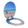 An open toilet seat with a beach scene design. Náhled obrázku produktu