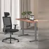 An office setting with a desk and chair. Podgląd zdjęcia produktu