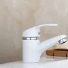 A white faucet is shown on a sink with a marble-like background. Produktbild-Vorschau