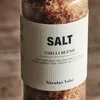 A close-up shot of a jar of chili blend salt. Produktbild-Vorschau