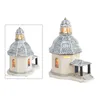 A ceramic Christmas village building, a chapel with a snow-covered roof and stained-glass windows, lit from within. Produktbild-Vorschau
