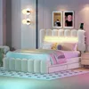 A bedroom scene with a bed, nightstand, and wall decor. Podgląd zdjęcia produktu