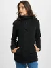 A woman wearing a black jacket. Produktbild-Vorschau