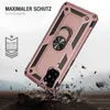A rugged phone case with a ring holder is shown in a dynamic, falling pose, with debris scattering around it, suggesting durability and protection. Produktbild-Vorschau