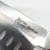 A close-up shot of a knife blade with branding and specifications etched into it. Produktbild-Vorschau