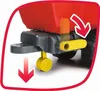 Close-up of a toy farm trailer hitch with a yellow lever and a small wheel. Produktbild-Vorschau