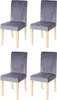 Four gray dining chairs with light wooden legs are arranged in a two-by-two grid against a white background. Voir les images du produit