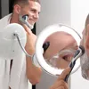 A man is shaving his face in front of a mirror, with a close-up reflection showing the shaving process. Podgląd zdjęcia produktu