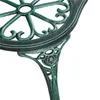 A close-up of the decorative detail on a green metal garden bench leg, showing a rose pattern. Podgląd zdjęcia produktu