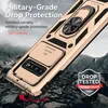 A gold phone case with a ring holder and camera slider is shown on a rocky, mountainous background, implying durability and protection. Produktbild-Vorschau