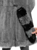 Close-up of the back of a grey costume with a striped tail. Produktbild-Vorschau