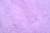 A close-up, top-down view of a fluffy, violet-colored rug. Anteprima dell’immagine prodotto