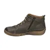 A side view of a green leather boot. Voir les images du produit