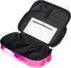 An open pencil case with a pink and purple tie-dye exterior and a black interior. A white insert with a grid and decorative border is visible inside. Voir les images du produit